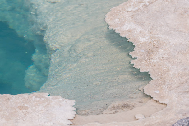 Layers of White and Blue in hot springs pool - 写真・画像