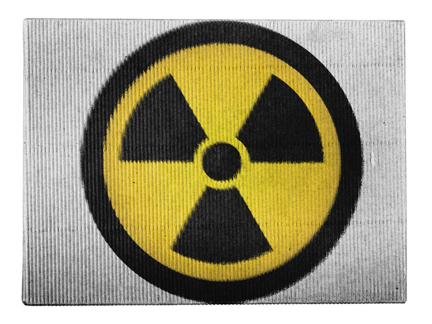 Nukleáris sugárzás szimbólum a festett, festett kartondoboz - Fotó, kép