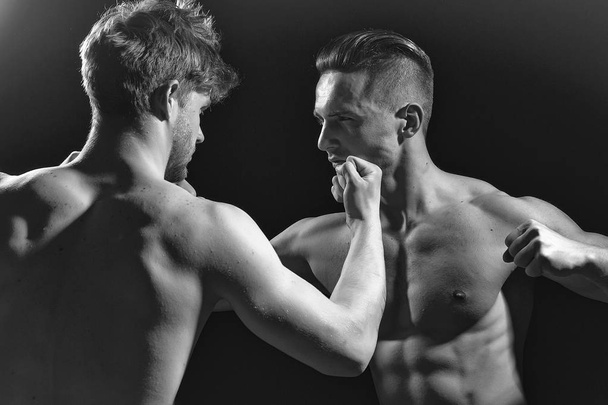 Young muscular men boxing - Photo, Image