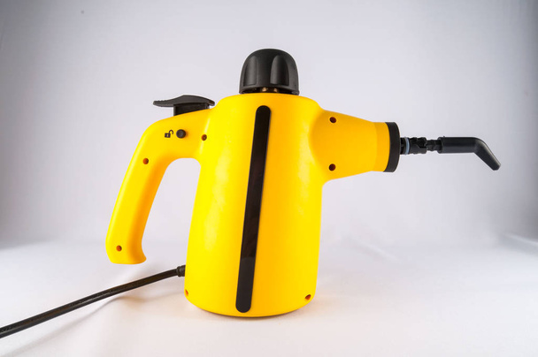 Picture of Yellow Hot Vapor Cleaning Machine - Photo, Image