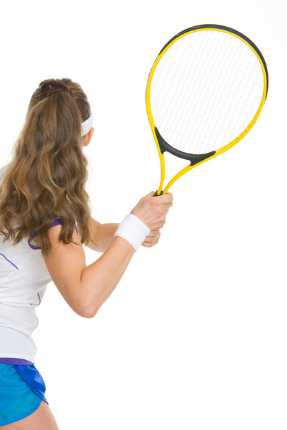 Tennis player ready to hit ball. rear view - Fotografie, Obrázek