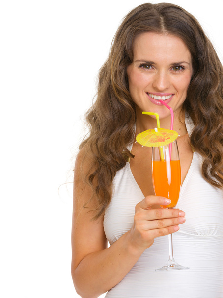 Smiling young woman in swimsuit drinking cocktail - Zdjęcie, obraz