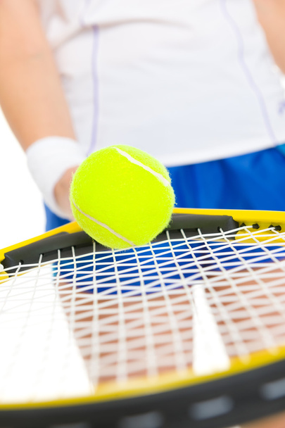 Closeup on tennis player balancing ball on racket - Foto, Imagem