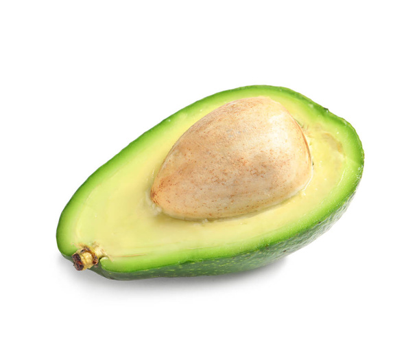 Half of avocado on white background. Natural food high in protein - Φωτογραφία, εικόνα
