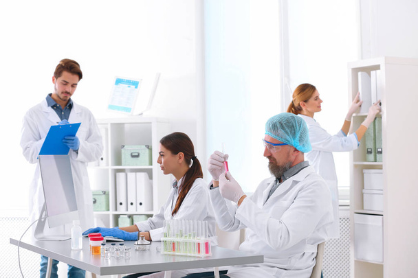 Scientists working in laboratory. Research and analysis - Φωτογραφία, εικόνα