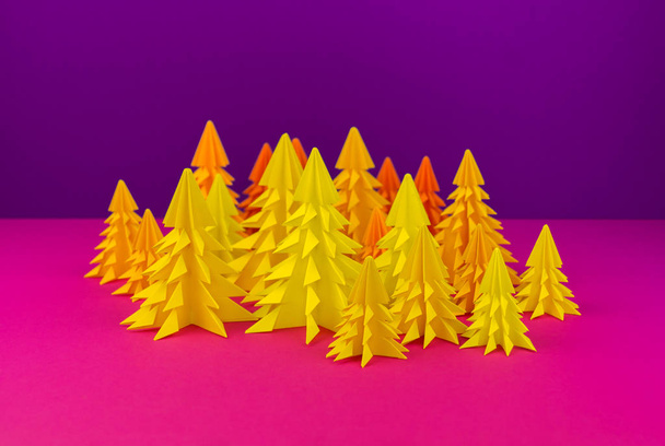 Christmas tree made of yellow craft paper. Handicraft. Violet and pink background. Forest - Valokuva, kuva