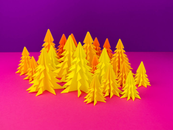 Christmas tree made of yellow craft paper. Handicraft. Violet and pink background. Forest - Fotó, kép