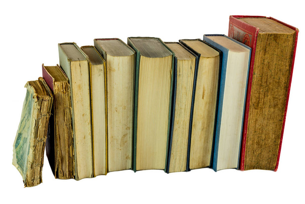 Pilha de muitos livro velho isolado em branco
 - Foto, Imagem