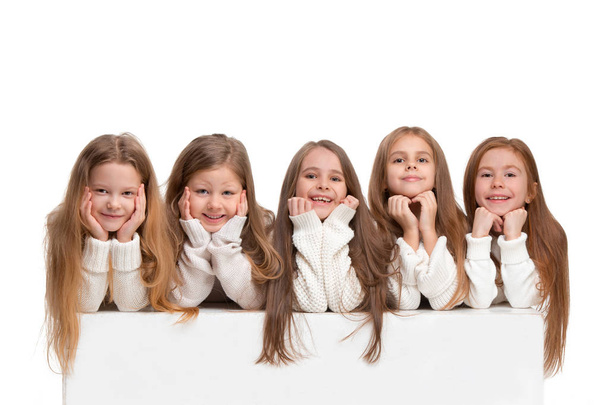 portrait of cute little kids in stylish clothes looking at camera and smiling - Photo, image