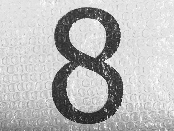 8 Oito números pintados em bolhas
 - Foto, Imagem