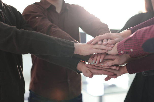 successful business team with hands clasped together. - Фото, изображение