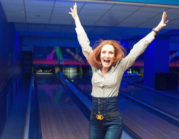 Excited girl in a bowling - Photo, Image