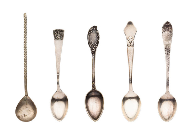 Top view of set old silver beautiful tea spoons isolated on white background - Foto, Bild