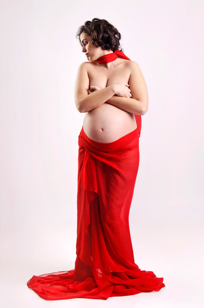 Pregnant in red - Photo, Image