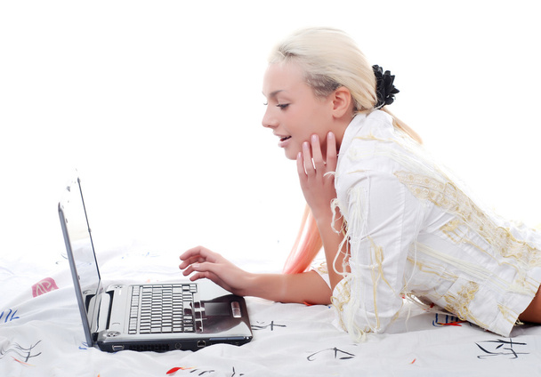 Young woman with laptop - Photo, Image