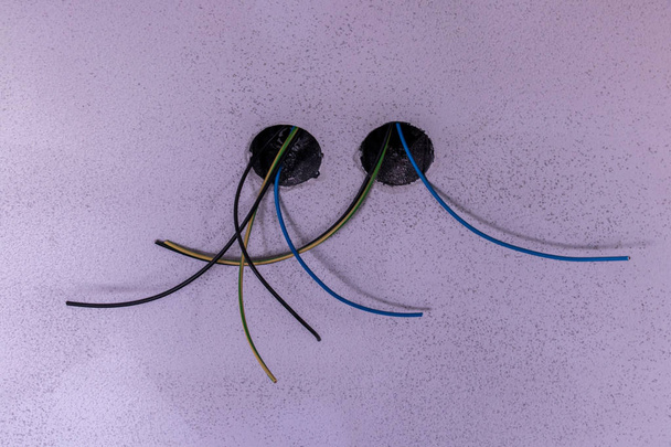 a few different cables looking from wall - Photo, Image