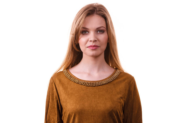 Young blonde fashionable pretty woman wearing brown top. Female being fashionable and smiling. - Фото, изображение