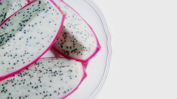 Fresh dragon fruit placed on the plate - Foto, Imagen