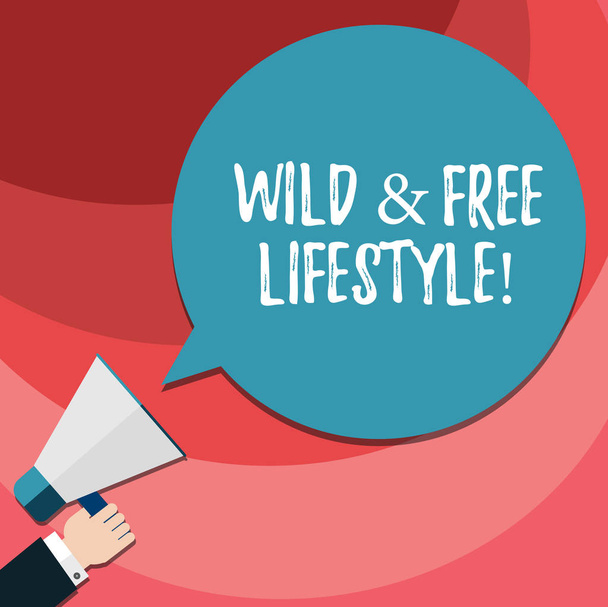 Word writing text Wild And Free Lifestyle. Business concept for Freedom natural way of living outdoor activities Hu analysis Hand Holding Megaphone Blank Round Color Speech Bubble photo. - Photo, Image