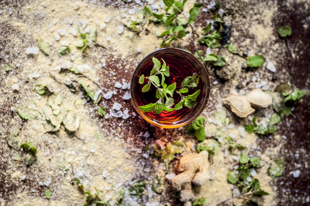 Ayurvedic herbal drink with basil and ginger powder - 写真・画像