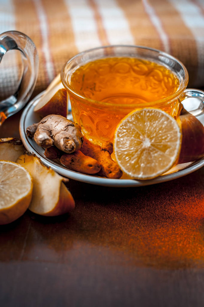 Close up of herbal tea with ginger and lemon - Zdjęcie, obraz