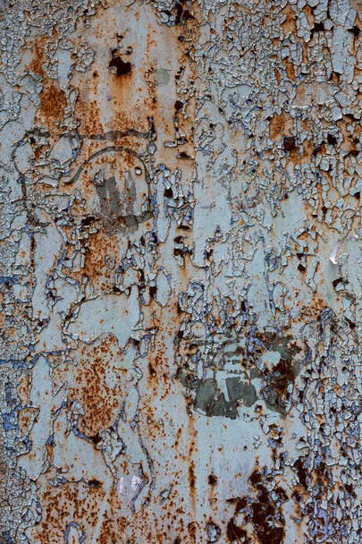 An old destroyed wall with large large cracks. Background of crack on an old wall as background for creative design. Destroyed cracked wall of building after earthquake and hurricane - Photo, Image