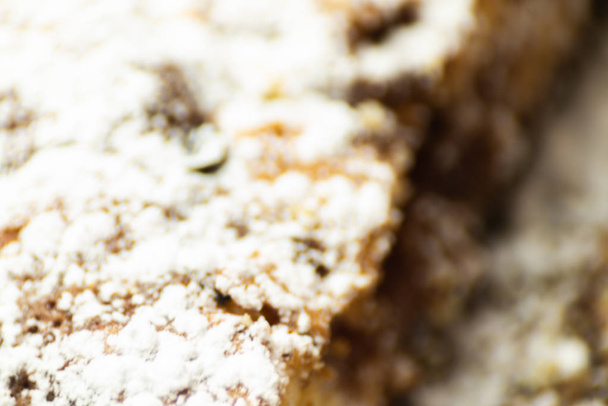 closeup on a crumb cake stuffed with strawberry marmalade, delicious dessert - Foto, Imagen