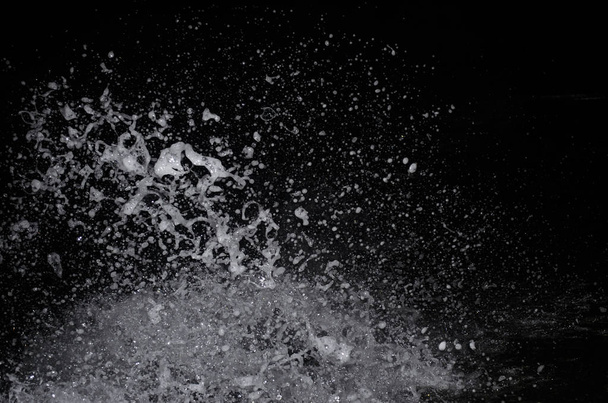 Splashing wave on the Black sea in the night. - Foto, Bild