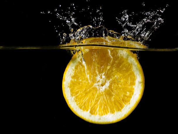 Orange is splashing - Foto, Bild