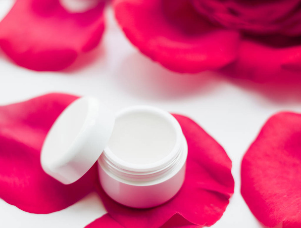 beauty cream jar and rose petals - cosmetics with flowers styled concept, elegant visuals - Fotó, kép