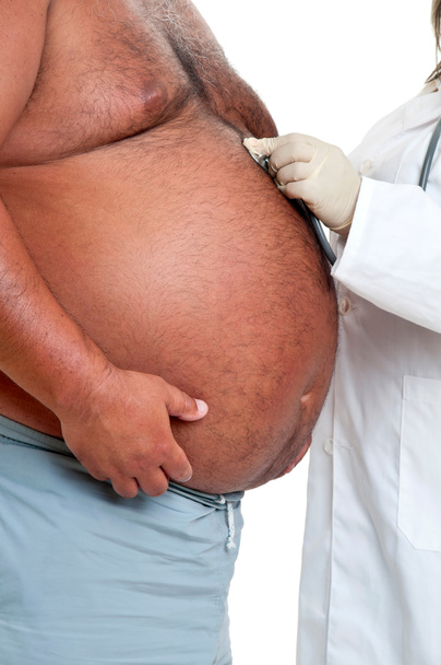 Mano del doctor con paciente masculino muy gordo
 - Foto, imagen
