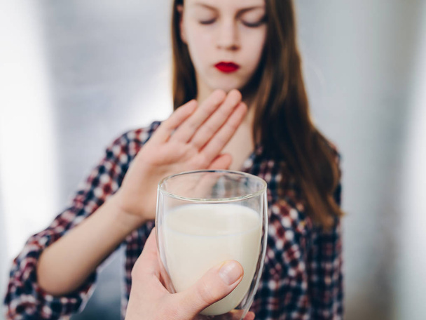 Girl having milk allergy - lactose intolerance concept - Foto, afbeelding