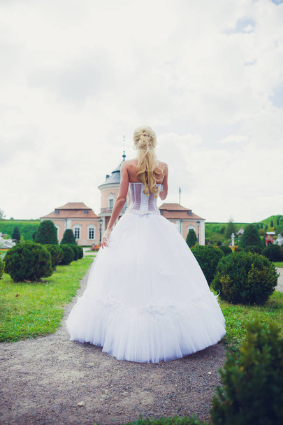 Beautiful sensual bride blonde in wedding dress  - Foto, Bild
