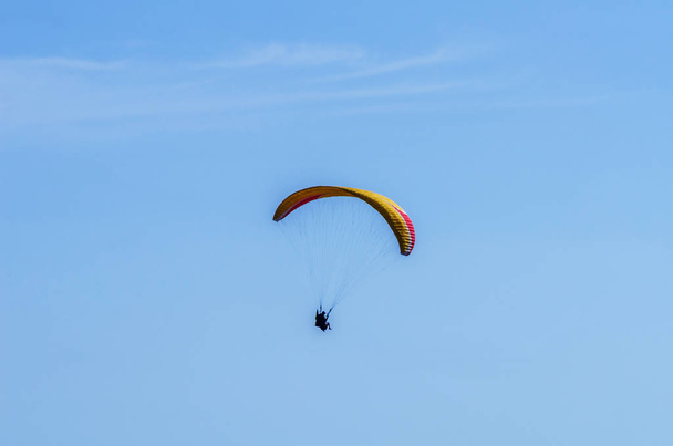Paraglider flying in the sky free time spent actively wonderful experiences vacation, active sport - Photo, Image