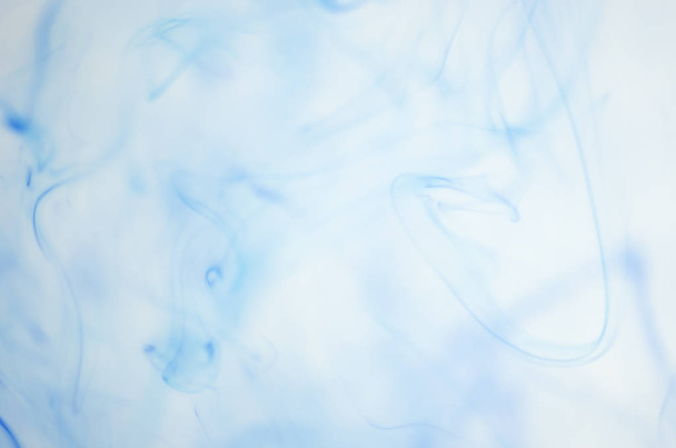 clouds of blue smoke over white background - Foto, Imagen