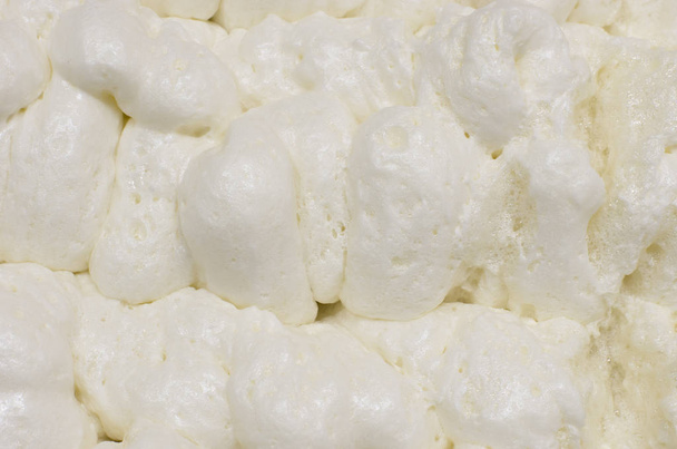 closeup view of sweet white cream foam background - Фото, изображение
