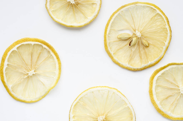 closeup view of lemon citrus fruits slices over white background - Foto, immagini