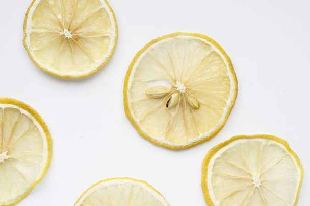 closeup view of lemon citrus fruits slices over white background - Foto, immagini