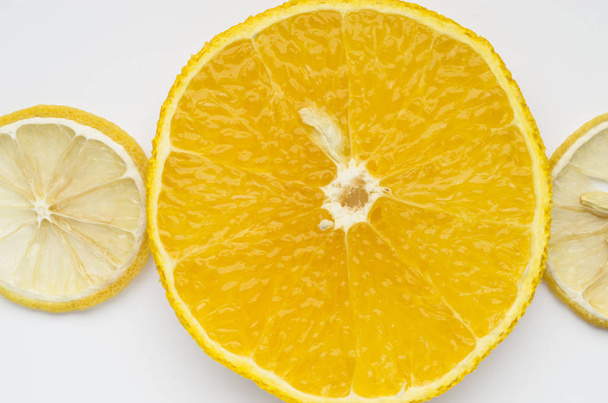 closeup view of lemon and orange citrus fruits slices over white background - Fotoğraf, Görsel