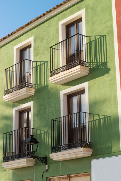 Colored buildings, old town architecture in La Vila, Costa Blanca, Spain. - Фото, изображение