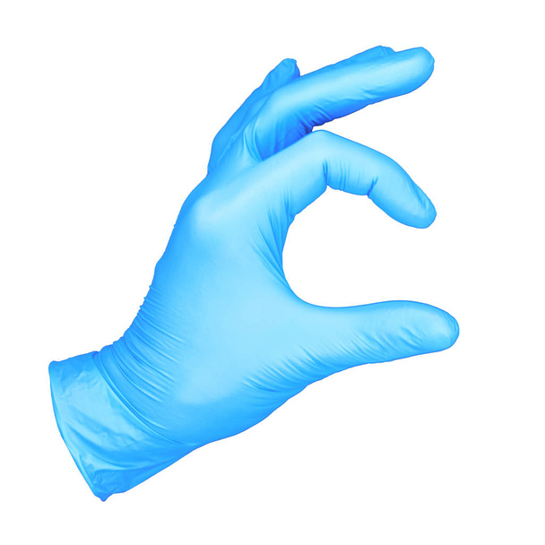 photo hand insulated glove that that holds / hand in simulation position - Φωτογραφία, εικόνα