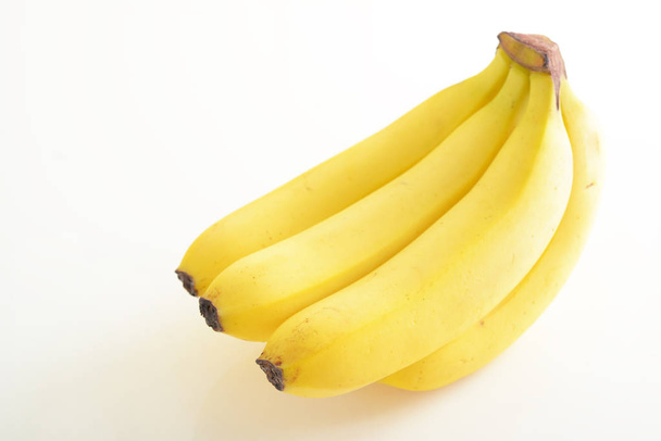 Fresh bananas isolated on white background - Foto, afbeelding