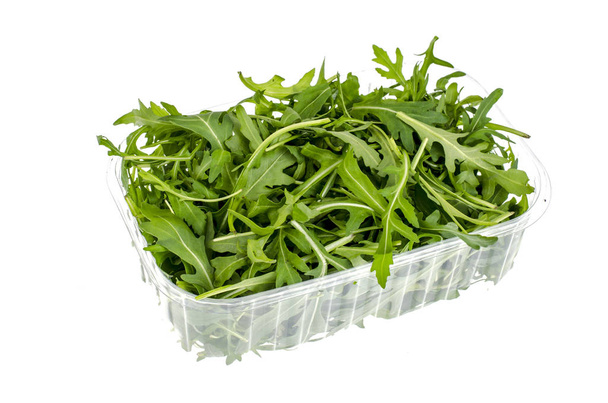 Friss zöld sült saláta kitûnõ csomag elszigetelt fehér background. Fotó stúdió - Fotó, kép