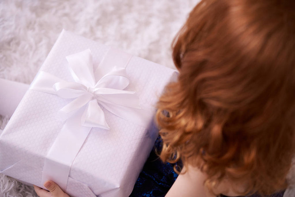Large gift box. White color. Red hair. - Foto, immagini