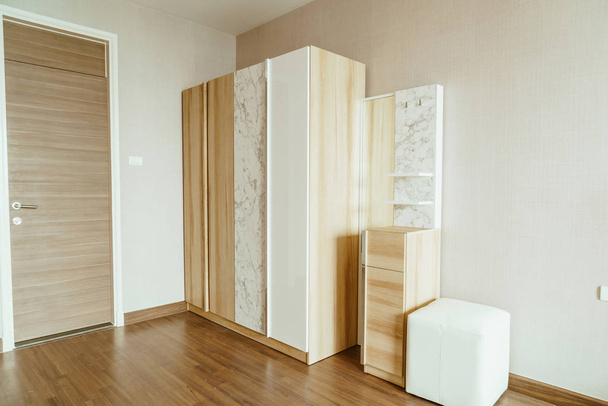 beautiful wooden wardrobe in a room - Valokuva, kuva