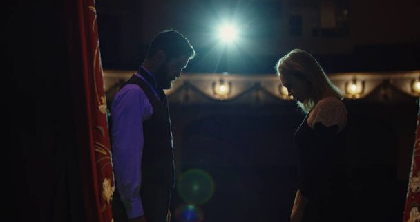Actors performing a scene in a theater - Fotó, kép