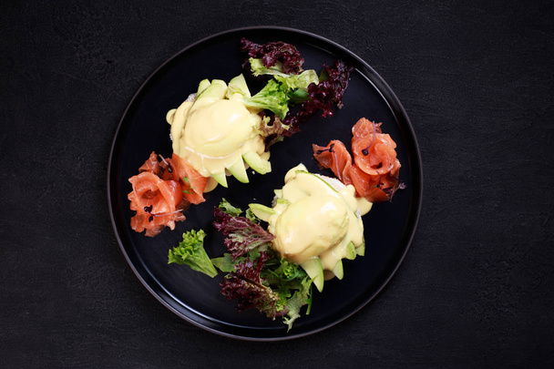 Bread toast and poached egg with smoked salmon - Photo, image