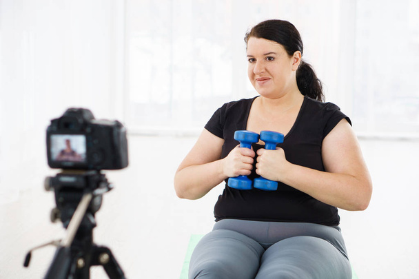 overweight blogger recording content for vlog - Foto, Imagem