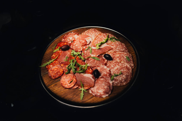 close up shot of served table with various sausages  - Фото, изображение