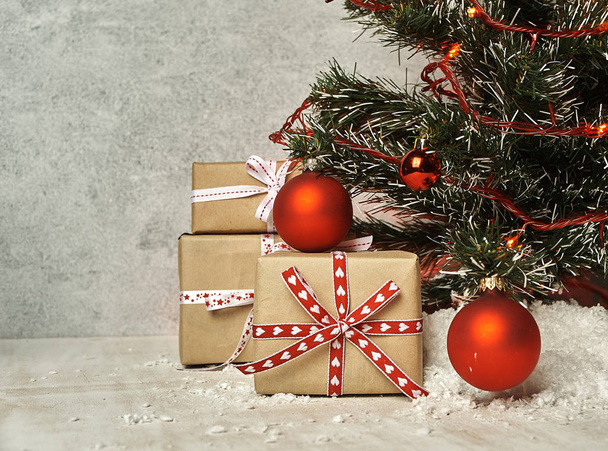 presents under christmas tree with beautiful shiny decorations   - Zdjęcie, obraz